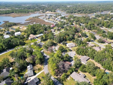 Welcome to your dream home in the heart of the serene and on Gulf Hills Golf Club in Mississippi - for sale on GolfHomes.com, golf home, golf lot