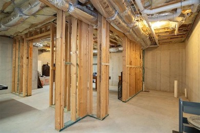 Discover timeless elegance and modern comfort in this on Woodmont Golf and Country Club in Georgia - for sale on GolfHomes.com, golf home, golf lot