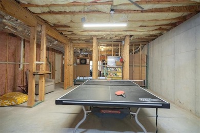 Discover timeless elegance and modern comfort in this on Woodmont Golf and Country Club in Georgia - for sale on GolfHomes.com, golf home, golf lot