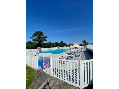 This cozy 2 bedroom 2 bath home located in a quiet section of on Captains Cove Golf and Yacht Club in Virginia - for sale on GolfHomes.com, golf home, golf lot