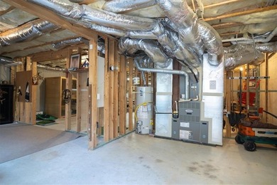 Discover timeless elegance and modern comfort in this on Woodmont Golf and Country Club in Georgia - for sale on GolfHomes.com, golf home, golf lot