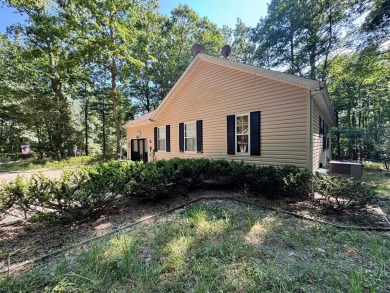 This cozy 2 bedroom 2 bath home located in a quiet section of on Captains Cove Golf and Yacht Club in Virginia - for sale on GolfHomes.com, golf home, golf lot