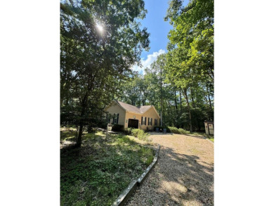 This cozy 2 bedroom 2 bath home located in a quiet section of on Captains Cove Golf and Yacht Club in Virginia - for sale on GolfHomes.com, golf home, golf lot
