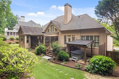 Discover timeless elegance and modern comfort in this on Woodmont Golf and Country Club in Georgia - for sale on GolfHomes.com, golf home, golf lot