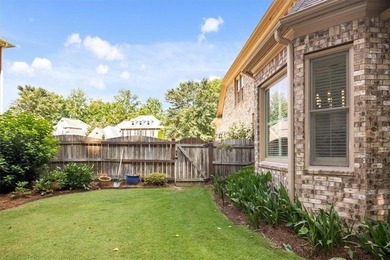 Discover timeless elegance and modern comfort in this on Woodmont Golf and Country Club in Georgia - for sale on GolfHomes.com, golf home, golf lot