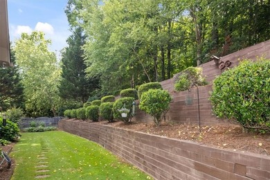 Discover timeless elegance and modern comfort in this on Woodmont Golf and Country Club in Georgia - for sale on GolfHomes.com, golf home, golf lot