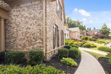 Discover timeless elegance and modern comfort in this on Woodmont Golf and Country Club in Georgia - for sale on GolfHomes.com, golf home, golf lot