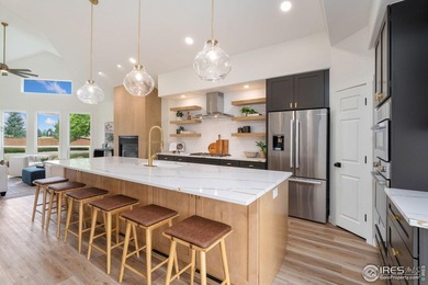 Perched on the prestigious first hole of Ptarmigan Country Club on Ptarmigan Golf Course in Colorado - for sale on GolfHomes.com, golf home, golf lot