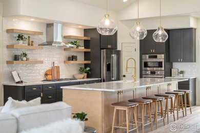 Perched on the prestigious first hole of Ptarmigan Country Club on Ptarmigan Golf Course in Colorado - for sale on GolfHomes.com, golf home, golf lot