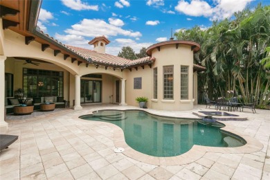 Experience the art of fine living in this exquisite one-story on Isleworth Golf and Country Club in Florida - for sale on GolfHomes.com, golf home, golf lot