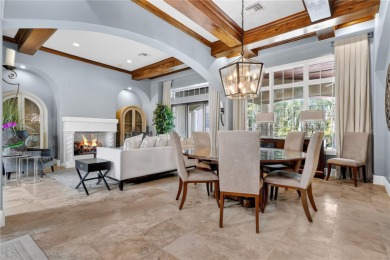 Experience the art of fine living in this exquisite one-story on Isleworth Golf and Country Club in Florida - for sale on GolfHomes.com, golf home, golf lot