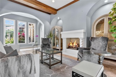 Experience the art of fine living in this exquisite one-story on Isleworth Golf and Country Club in Florida - for sale on GolfHomes.com, golf home, golf lot