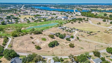 This expansive 3+ acre tract, located just outside the city on Harbor Lakes Golf Club in Texas - for sale on GolfHomes.com, golf home, golf lot