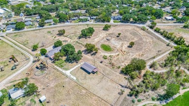 This expansive 3+ acre tract, located just outside the city on Harbor Lakes Golf Club in Texas - for sale on GolfHomes.com, golf home, golf lot