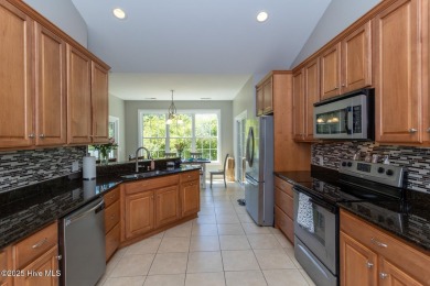 Welcome to this bright, open, and family-friendly brick home on on Beacon Ridge Golf and Country Club in North Carolina - for sale on GolfHomes.com, golf home, golf lot