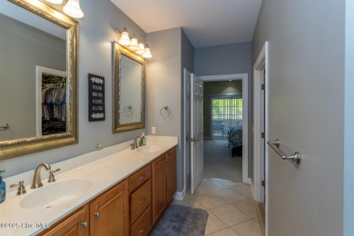 Welcome to this bright, open, and family-friendly brick home on on Beacon Ridge Golf and Country Club in North Carolina - for sale on GolfHomes.com, golf home, golf lot