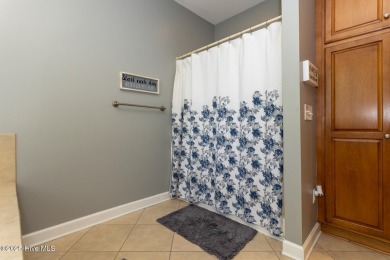 Welcome to this bright, open, and family-friendly brick home on on Beacon Ridge Golf and Country Club in North Carolina - for sale on GolfHomes.com, golf home, golf lot