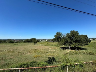 This expansive 3+ acre tract, located just outside the city on Harbor Lakes Golf Club in Texas - for sale on GolfHomes.com, golf home, golf lot