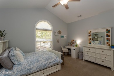 Welcome to this bright, open, and family-friendly brick home on on Beacon Ridge Golf and Country Club in North Carolina - for sale on GolfHomes.com, golf home, golf lot