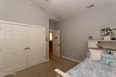 Welcome to this bright, open, and family-friendly brick home on on Beacon Ridge Golf and Country Club in North Carolina - for sale on GolfHomes.com, golf home, golf lot