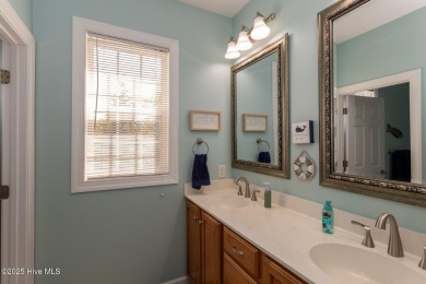 Welcome to this bright, open, and family-friendly brick home on on Beacon Ridge Golf and Country Club in North Carolina - for sale on GolfHomes.com, golf home, golf lot