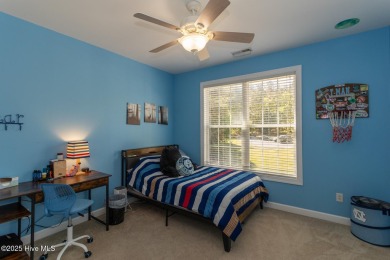 Welcome to this bright, open, and family-friendly brick home on on Beacon Ridge Golf and Country Club in North Carolina - for sale on GolfHomes.com, golf home, golf lot