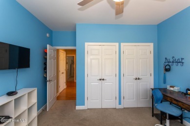 Welcome to this bright, open, and family-friendly brick home on on Beacon Ridge Golf and Country Club in North Carolina - for sale on GolfHomes.com, golf home, golf lot