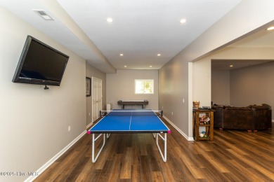 Welcome to this bright, open, and family-friendly brick home on on Beacon Ridge Golf and Country Club in North Carolina - for sale on GolfHomes.com, golf home, golf lot