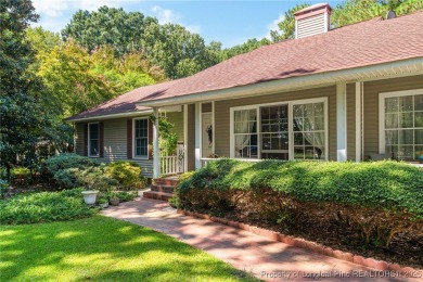 Nestled along the 3rd fairway of the Carolina Trace Lake Course on Carolina Trace Country Club in North Carolina - for sale on GolfHomes.com, golf home, golf lot