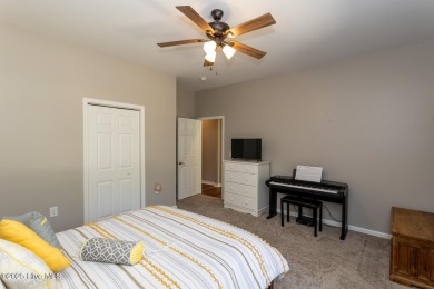 Welcome to this bright, open, and family-friendly brick home on on Beacon Ridge Golf and Country Club in North Carolina - for sale on GolfHomes.com, golf home, golf lot