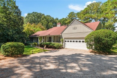 Nestled along the 3rd fairway of the Carolina Trace Lake Course on Carolina Trace Country Club in North Carolina - for sale on GolfHomes.com, golf home, golf lot