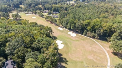 Nestled along the 3rd fairway of the Carolina Trace Lake Course on Carolina Trace Country Club in North Carolina - for sale on GolfHomes.com, golf home, golf lot