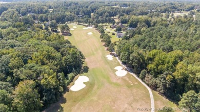 Nestled along the 3rd fairway of the Carolina Trace Lake Course on Carolina Trace Country Club in North Carolina - for sale on GolfHomes.com, golf home, golf lot