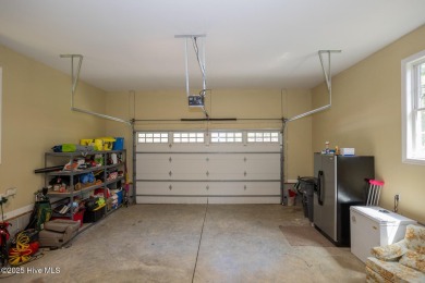 Welcome to this bright, open, and family-friendly brick home on on Beacon Ridge Golf and Country Club in North Carolina - for sale on GolfHomes.com, golf home, golf lot