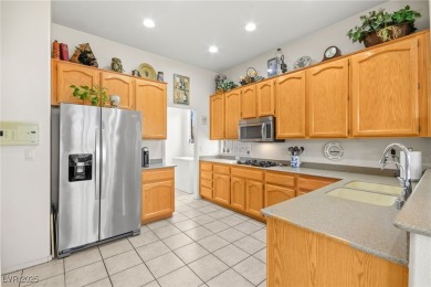 This charming 2-bedroom, 2-bathroom home in Sun City MacDonald on Desert Willow Golf Course in Nevada - for sale on GolfHomes.com, golf home, golf lot