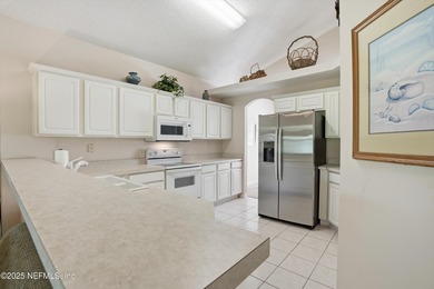 Nestled within the gated golf community of Cimarrone Golf & on Cimarrone Golf and Country Club in Florida - for sale on GolfHomes.com, golf home, golf lot