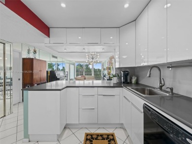Step into South Florida living with this corner-unit stunning on Oaks Country Club in Florida - for sale on GolfHomes.com, golf home, golf lot