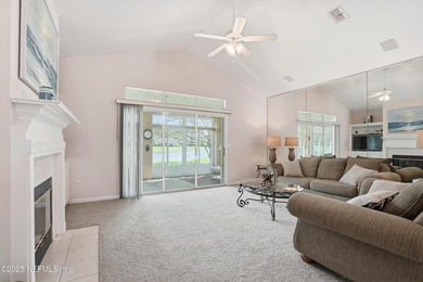 Nestled within the gated golf community of Cimarrone Golf & on Cimarrone Golf and Country Club in Florida - for sale on GolfHomes.com, golf home, golf lot