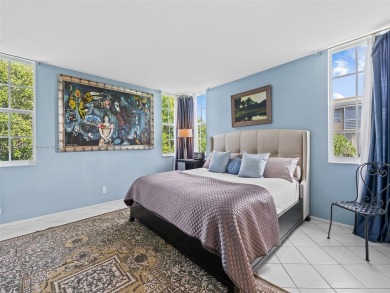 Step into South Florida living with this corner-unit stunning on Oaks Country Club in Florida - for sale on GolfHomes.com, golf home, golf lot