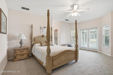 Nestled within the gated golf community of Cimarrone Golf & on Cimarrone Golf and Country Club in Florida - for sale on GolfHomes.com, golf home, golf lot