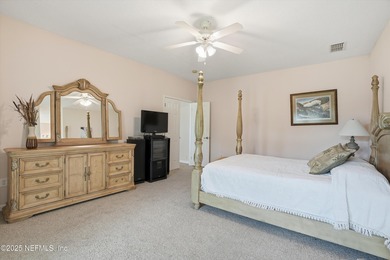 Nestled within the gated golf community of Cimarrone Golf & on Cimarrone Golf and Country Club in Florida - for sale on GolfHomes.com, golf home, golf lot