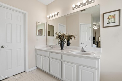 Nestled within the gated golf community of Cimarrone Golf & on Cimarrone Golf and Country Club in Florida - for sale on GolfHomes.com, golf home, golf lot