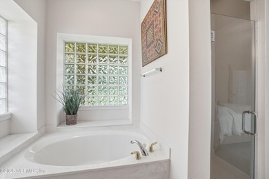 Nestled within the gated golf community of Cimarrone Golf & on Cimarrone Golf and Country Club in Florida - for sale on GolfHomes.com, golf home, golf lot