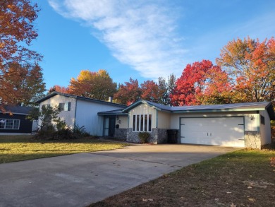 A remarkably well built property on a beautiful 18 hole on The Oaks At Kincheloe in Michigan - for sale on GolfHomes.com, golf home, golf lot