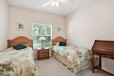 Nestled within the gated golf community of Cimarrone Golf & on Cimarrone Golf and Country Club in Florida - for sale on GolfHomes.com, golf home, golf lot