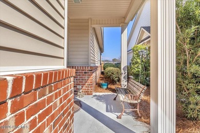 Experience coastal living in its meticulously maintained on South Harbour Golf Links in North Carolina - for sale on GolfHomes.com, golf home, golf lot