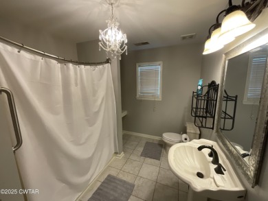 Peaceful and spacious 5 Bedroom, 3.5 bath all brick home on Dyersburg Country Club At The Farms in Tennessee - for sale on GolfHomes.com, golf home, golf lot