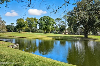 Nestled within the gated golf community of Cimarrone Golf & on Cimarrone Golf and Country Club in Florida - for sale on GolfHomes.com, golf home, golf lot