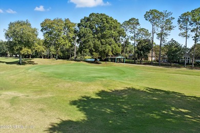 Nestled within the gated golf community of Cimarrone Golf & on Cimarrone Golf and Country Club in Florida - for sale on GolfHomes.com, golf home, golf lot