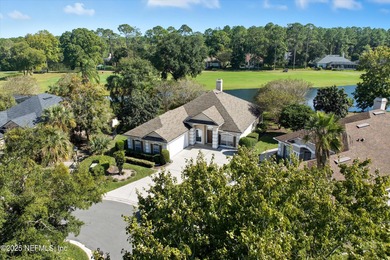 Nestled within the gated golf community of Cimarrone Golf & on Cimarrone Golf and Country Club in Florida - for sale on GolfHomes.com, golf home, golf lot
